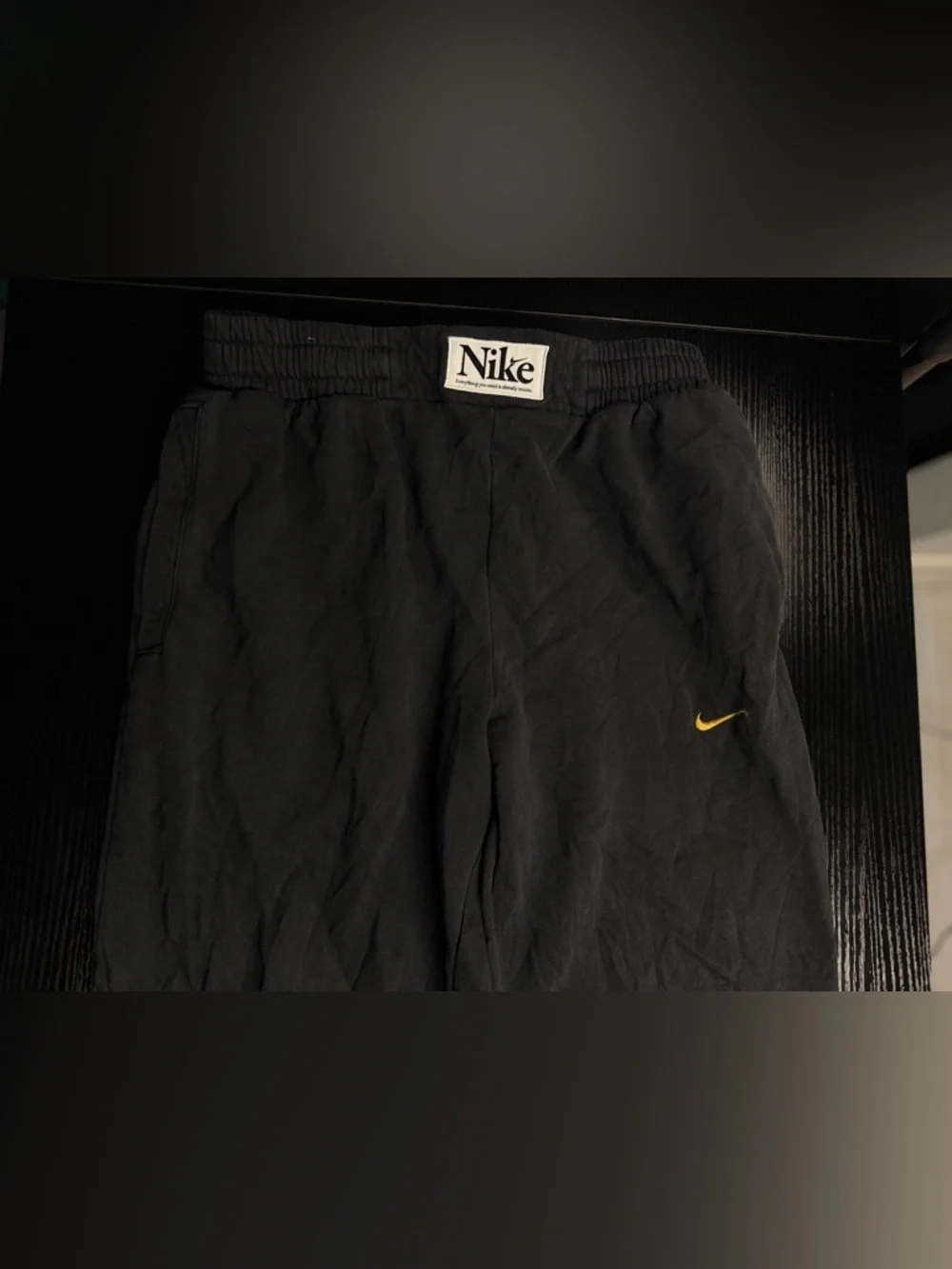 Vintage Nike Black Joggers with Yellow Swoosh Accent
